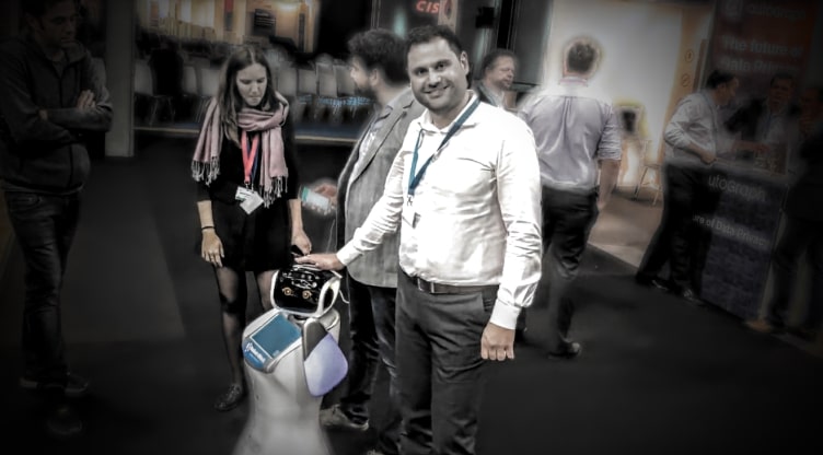 Isidoros Sideridis posing along with a AI-robot